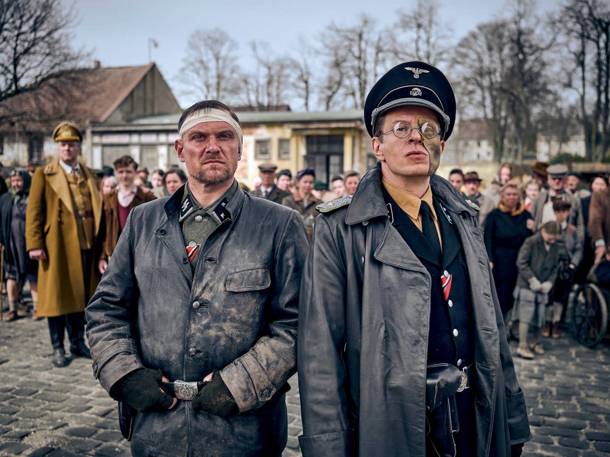 Florian Schmidtke as Dörfler and Alexander Scheer as Von Starnfeld in Blood & Gold, Courtesy of Netflix 2023