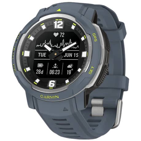 Garmin Instinct Crossover - Seite mit Band schräg - Granitblau Garmin Instinct Crossover - Seite mit Band schräg - Granitblau