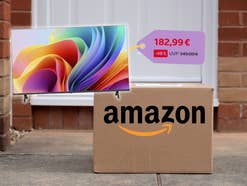 Amazon-Paket, daneben ein Fernseher mit einem 183-Euro-Preisschild und Rabatt
