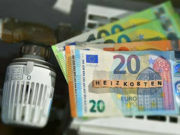 Euroscheine auf Heizkörper, Symbol für Heizkosten