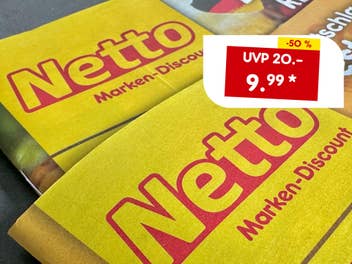 Netto Prospekte liegen auf dem Tisch