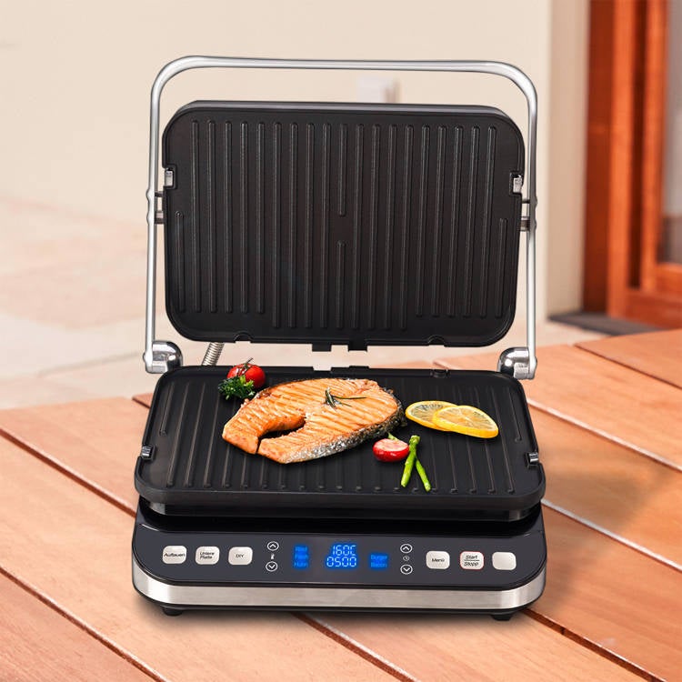 COOK 2-in-1 Kontakt- und Tischgrill steht auf einem Holztisch.