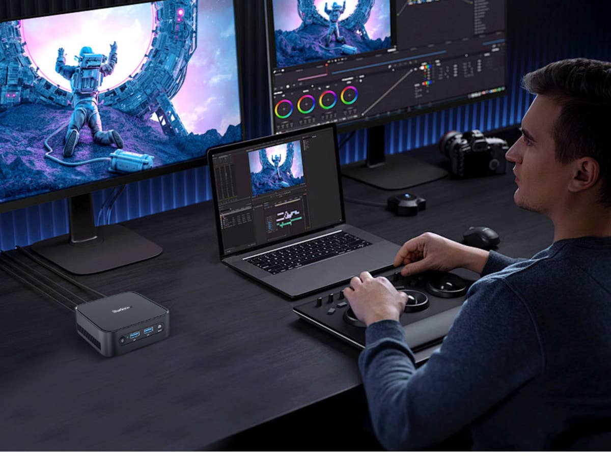 Der Blackview MP50 ist kompakt und leistungsstark Ein Mann sitzt vor mehreren Bildschirmen und bearbeitet ein Bild