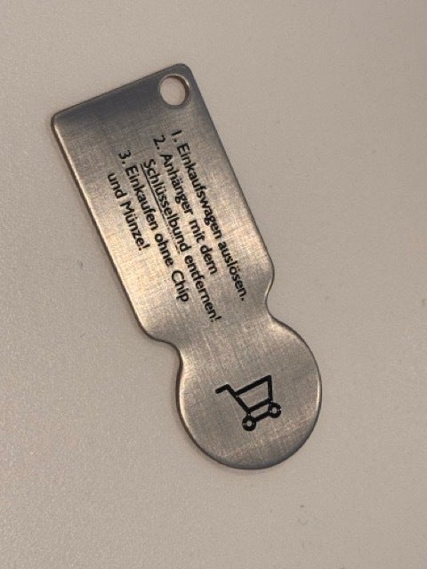 ein Einkaufswagenlöser