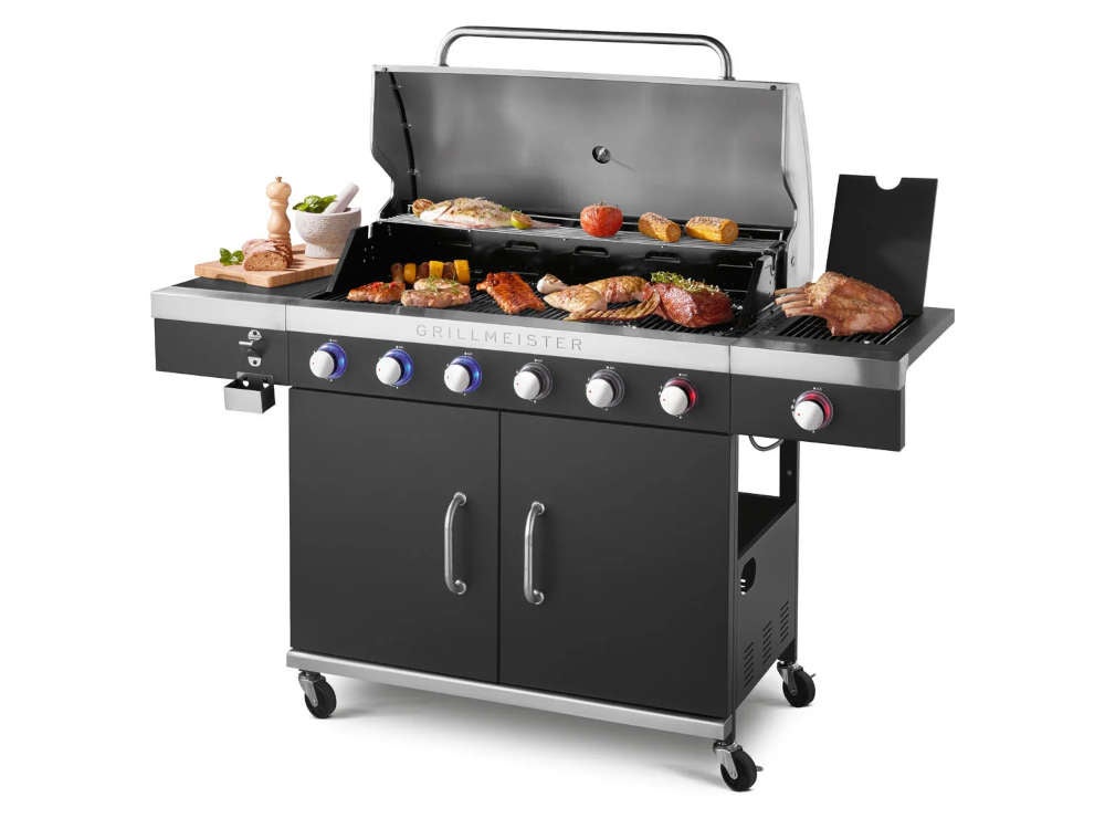 Grillmeister Gasgrill "6plus1 Brenner" mit Grillgut.