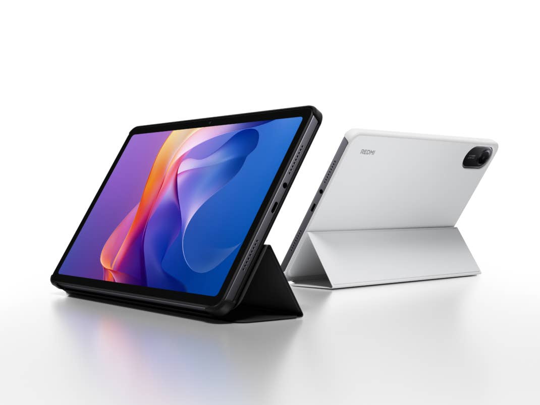 Xiaomi Redmi Pad 2 in schwarz und weiß, aufrecht mit einem bunten Bildschirm.
