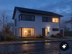 Licht als Einbruchschutz Ein Einfamilienhaus bei Abenddämmerung