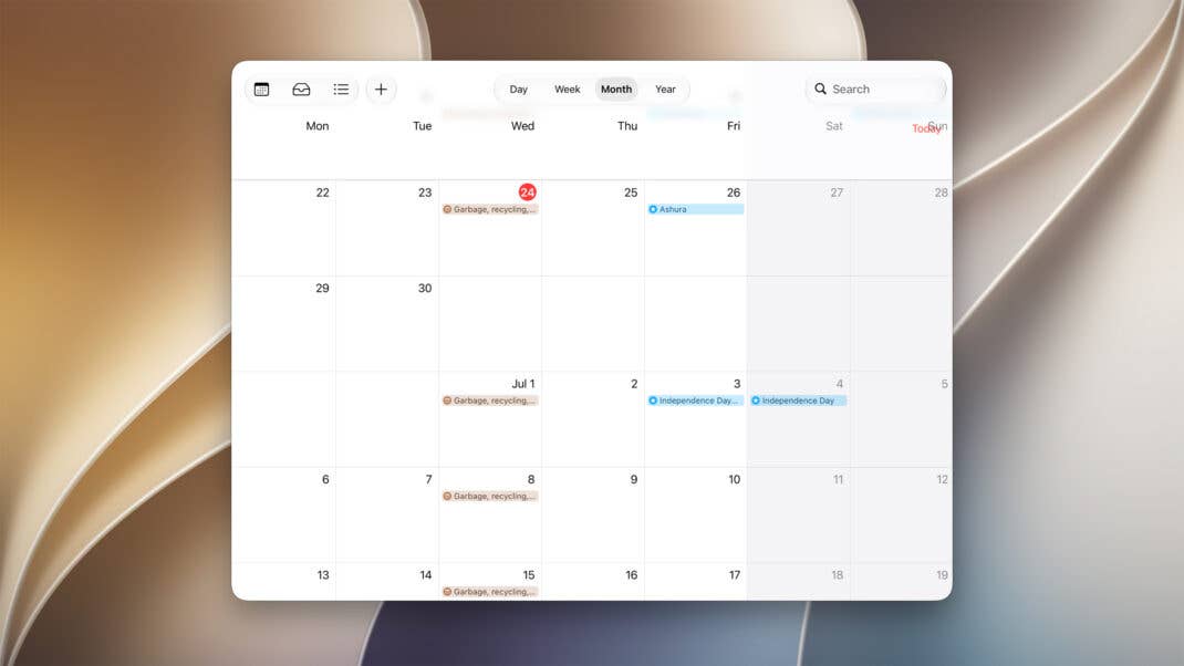Die Kalender-App in iOS 27 zeigt im breiten iPhone-Mirroring-Fenster eine Monatsansicht mit mehreren Wochen und Terminen.
