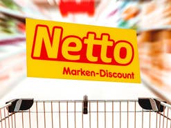 Einkaufswagen und Netto-Logo