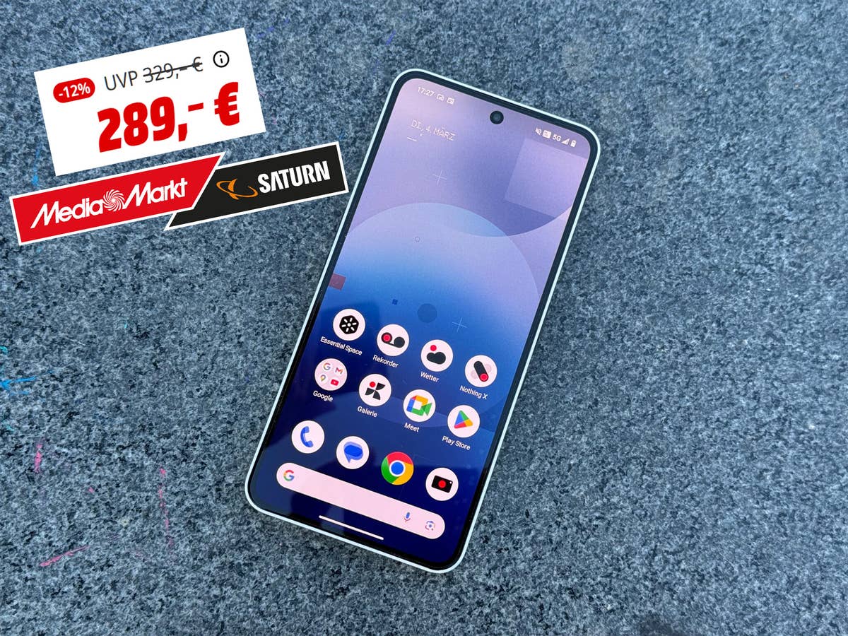 nothing-phone-3a-auf-boden-mit-angebot Das Nothing Phone (3a) liegt auf einem Steinboden und ein Angebot wird daneben angezeigt.