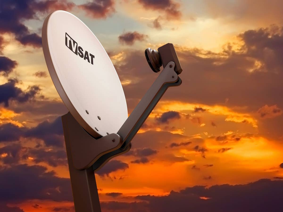 Satellite dish against a red sky