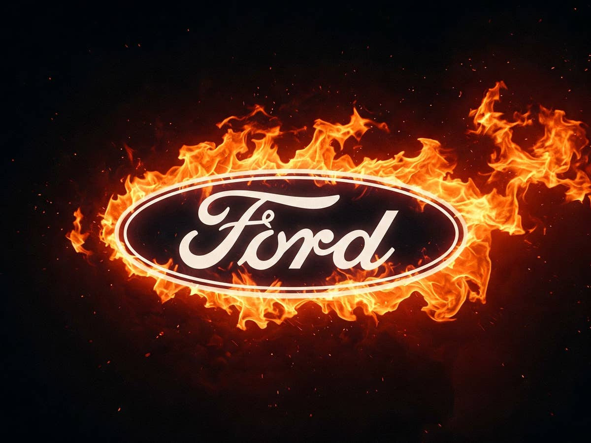 Brennendes Ford-Logo als Symbolbild für den ersten Streik in den Kölner Ford-Werken.