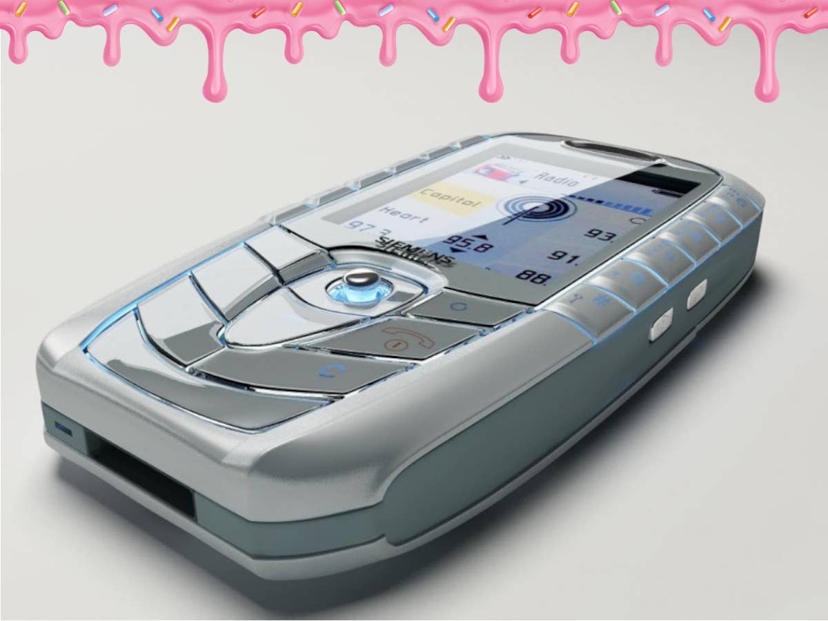 Siemens SX1 mit Zuckerguss Das Siemens SX1 auf einem Tisch, am Bildrand ist rosa Zuckerguss.