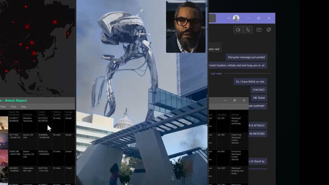 Auf einem Computer-Screen sieht man die Attacke der Aliens.